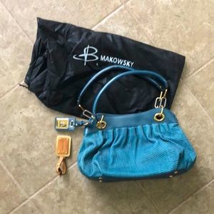 B. Makowsky blue leather handbag